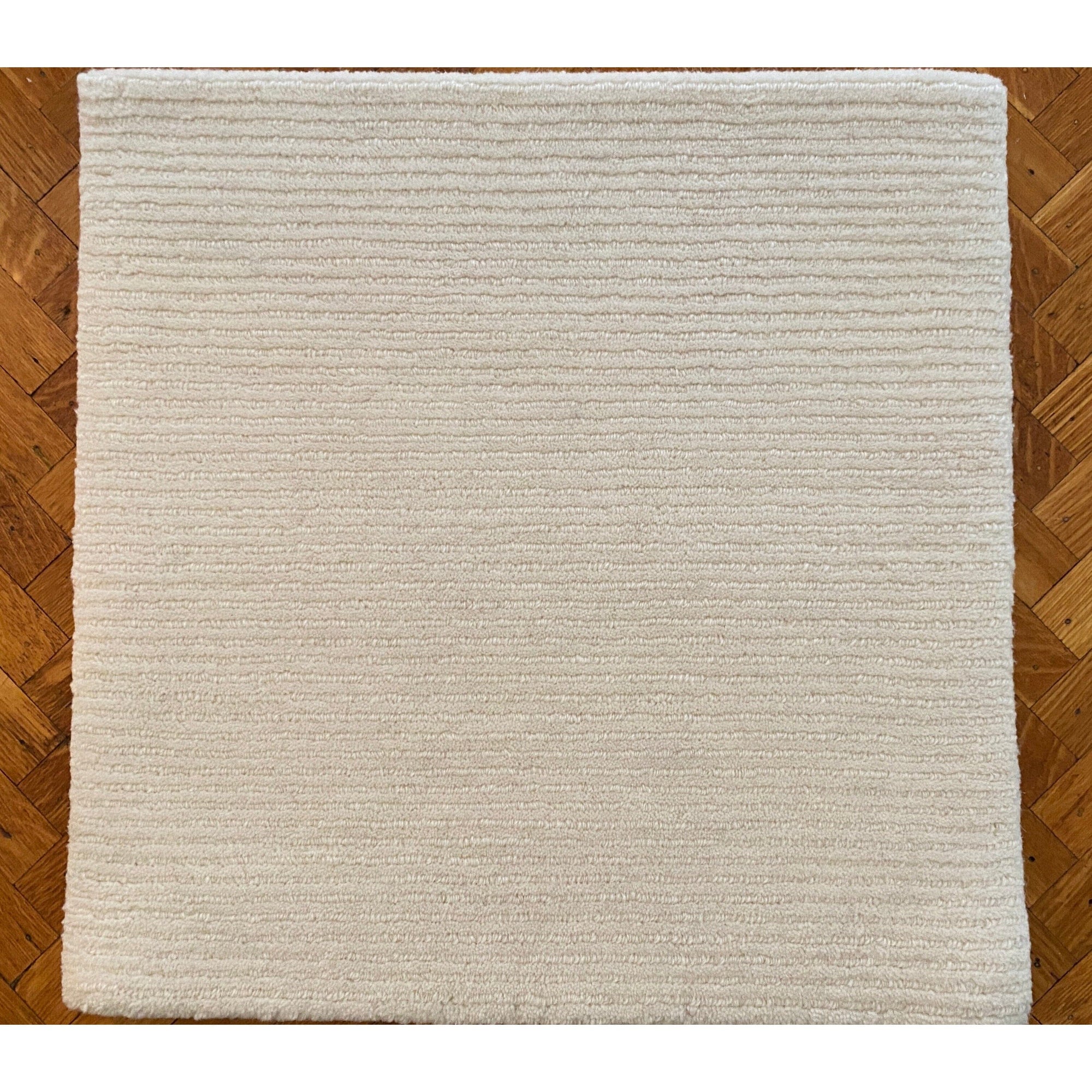 Easton Ivory Tibetan Handknotted Wool handknotted tibetan 60 knot Organic Weave Shop 6'x9' 